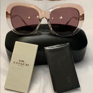 NWT Coach sunglasses. Exquisite flower on sides.